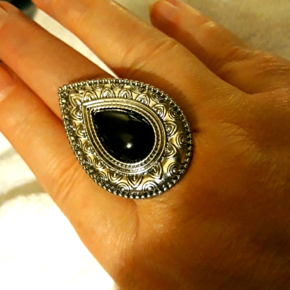 Costume ring with black stone. Fits 5 to 11